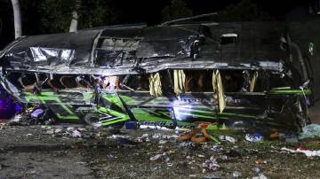A bus involved in a deadly crash in Indonesia's West Java had been carrying students and teachers. (AP PHOTO)