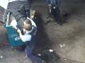Officers pull alleged armed robber from Sydney dumpster. Picture Nine