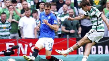 Celtic's Matt O'Riley scoring in what effectively was a Scottish title-clinching win over Rangers. (AP PHOTO)
