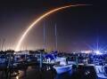 Elon Musk's Starlink owns about 60 per cent of the roughly 7500 satellites orbiting earth, (AP PHOTO)